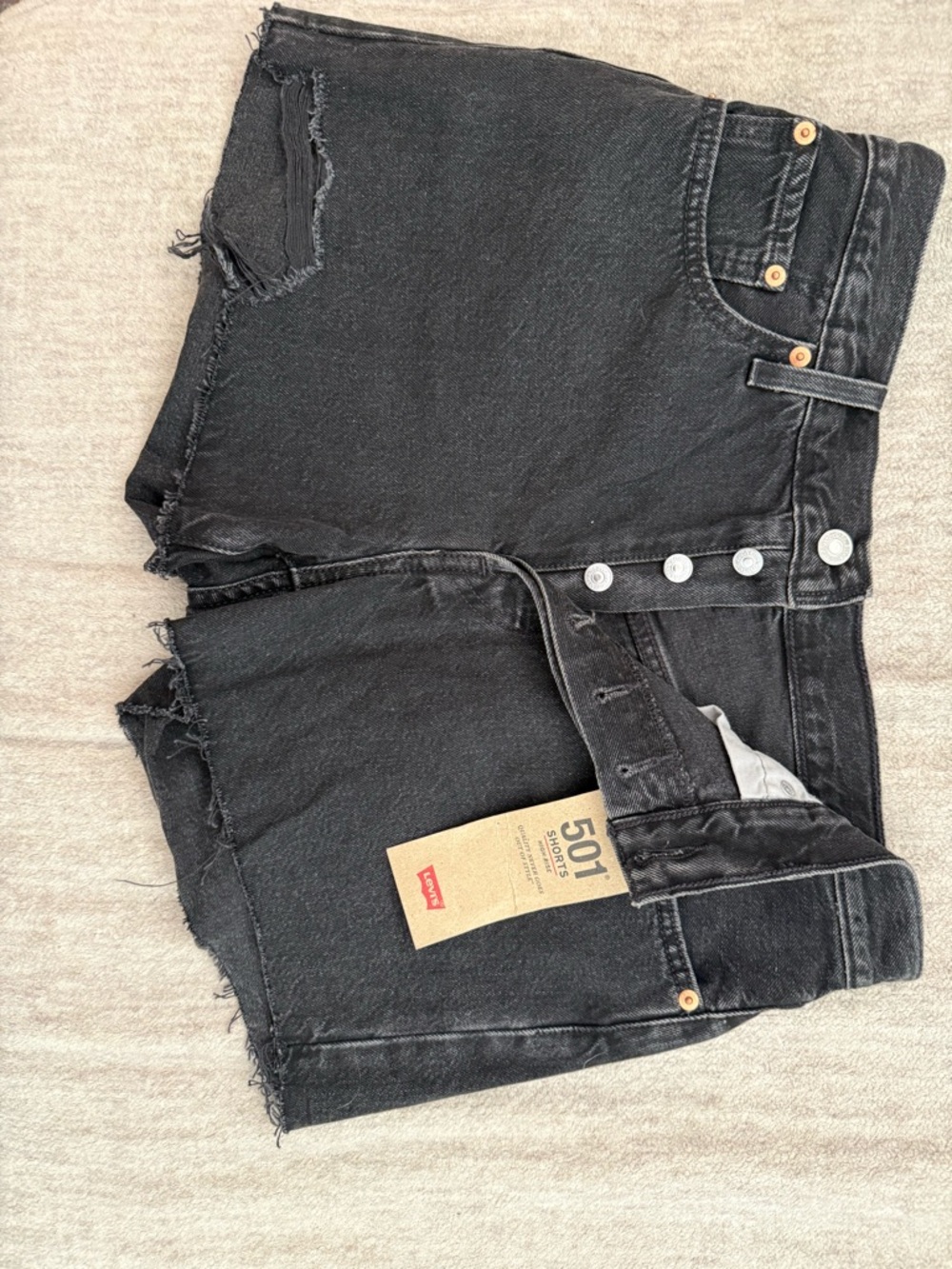 Levi's 501 black denim jeans with branded button